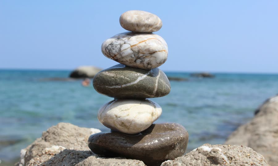Balanced stones by the sea